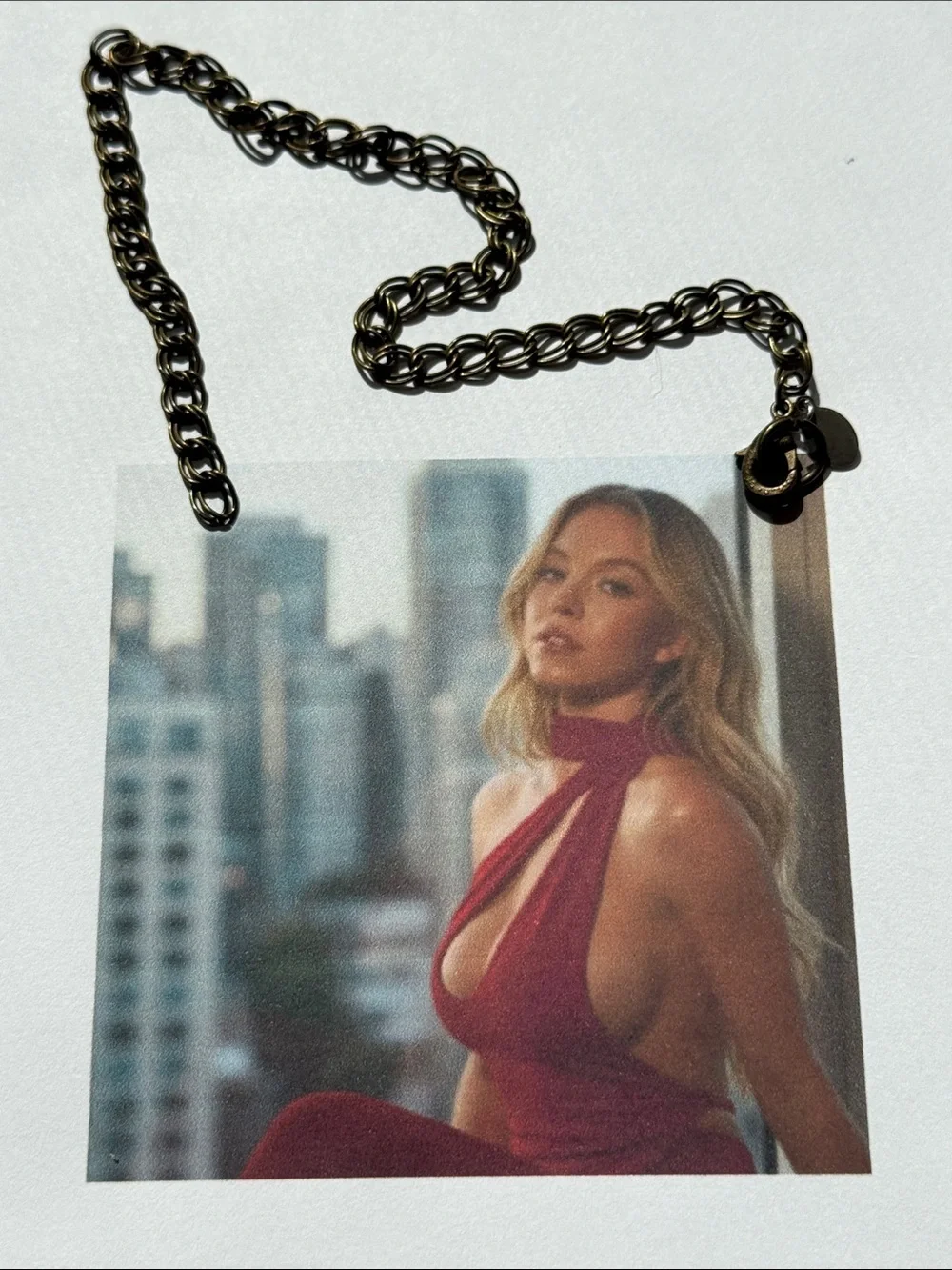 Sydney Sweeney in Red Halter Cutout Dress Ornament